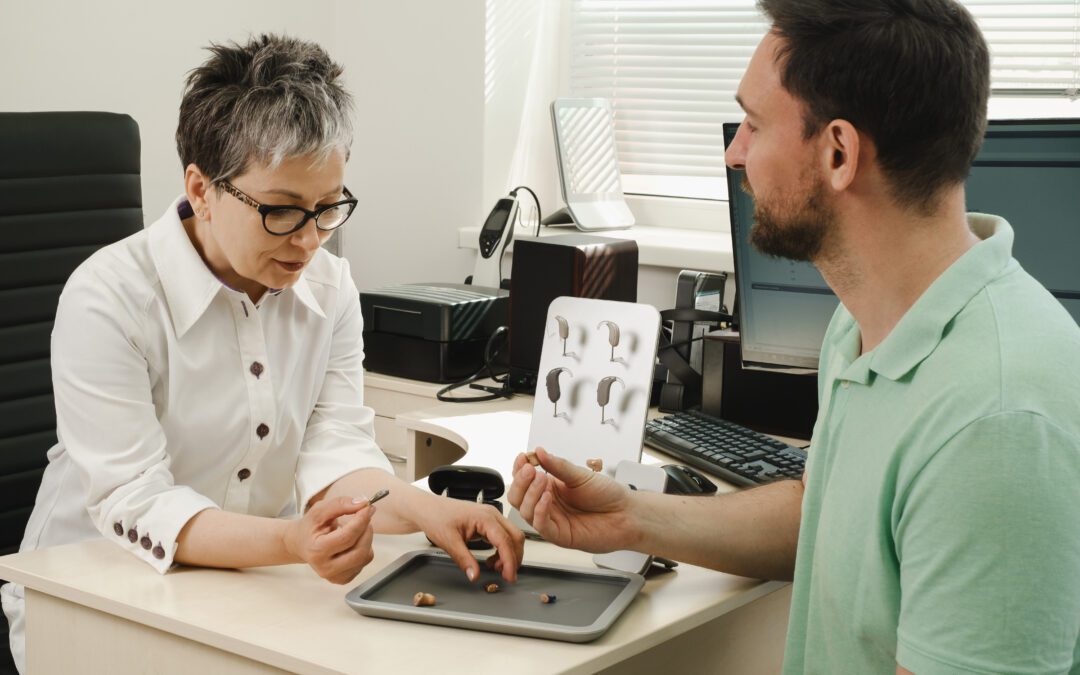audiologist in Wenatchee performing a hearing test with a patient | Horan and Fevold | hearing test wenatchee
