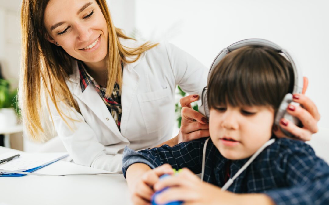 Audiologist in Wenatchee performing a pediatric hearing test | Horan & Fevold Hearing Clinic