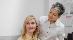 Wenatchee hearing doctor assessing patient with hearing test