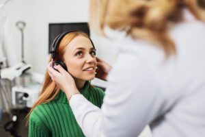 Audiologist conducting a hearing test for a patient in Wenatchee.