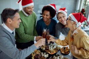 A cheerful holiday gathering in Wenatchee with family and friends, highlighting the importance of hearing health during festive moments.